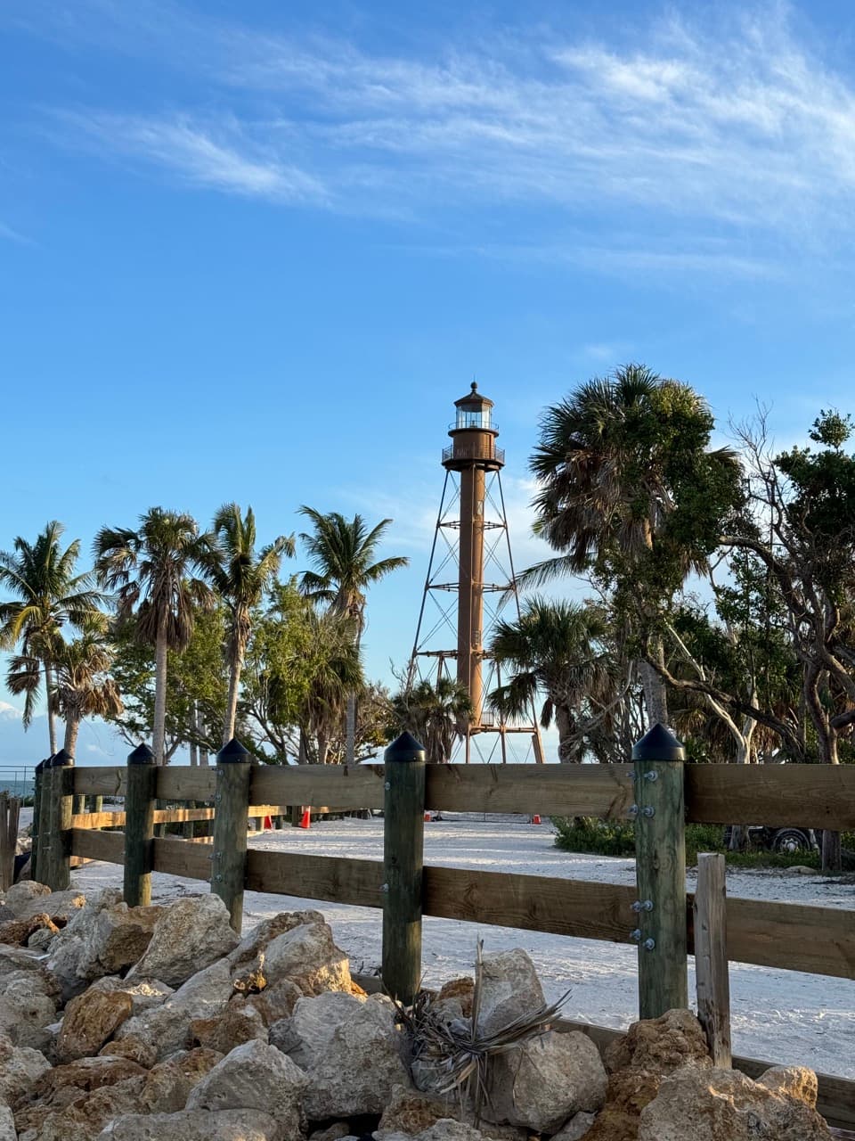 Historic Sanibel Lighthouse with palm trees
