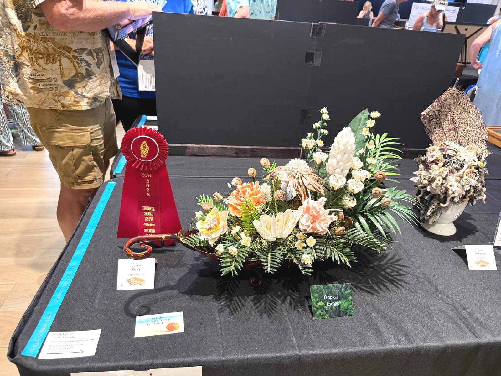 Tropical Escape shell flower arrangement — second place, Joann Kashfy